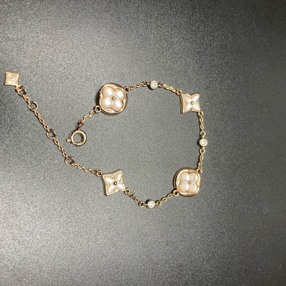 Louis Vuitton Silver Charm Gold Tone Mother Of Pearl Bracelet